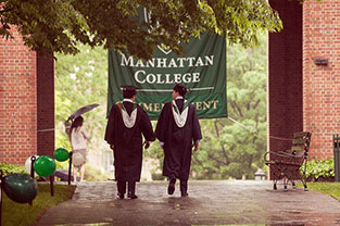 Photo of two graduates walking